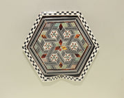 Coaster – "أصالة الخشب" (Asalat al-Khishab) – "Essence of Wood"