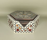 Coaster – "أصالة الخشب" (Asalat al-Khishab) – "Essence of Wood"